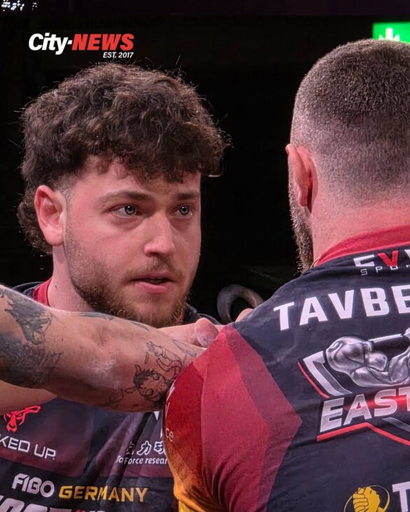 A close-up of Maayan Shterengas facing Zurab Tavberidze at the table, capturing the stillness and focus just before force is released.