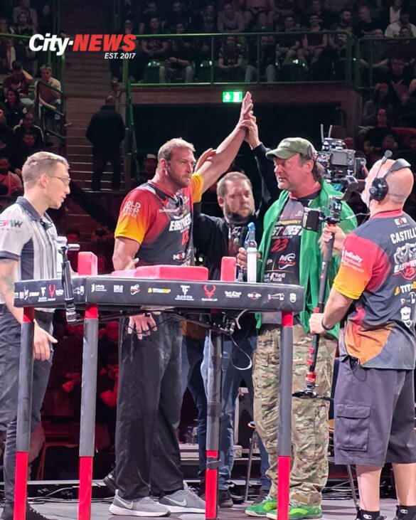 Matt Mask raises Devon Larratt’s arm after the match at East vs West 23, capturing recognition, relief and the emotional release that followed the main event.